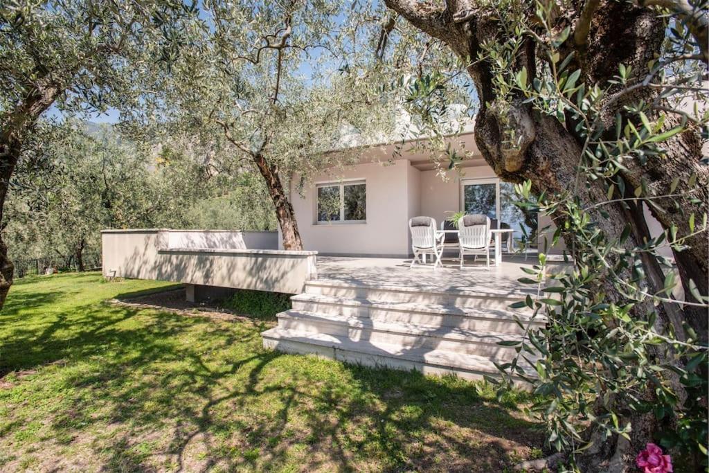 Casa Tra Gli Olivi Arco Exterior foto